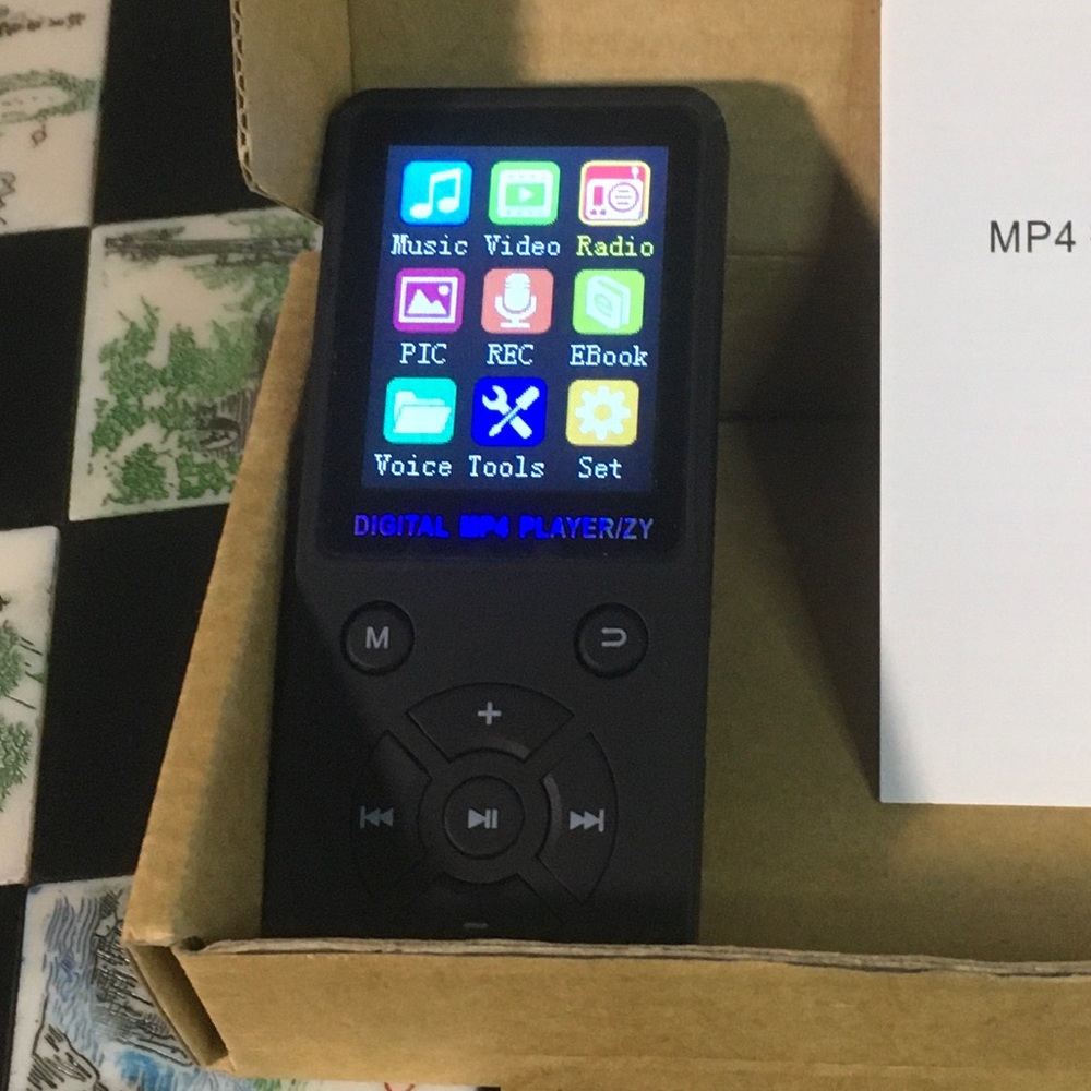MP4 Player / Recorder / FM Radio / 32 GB Micro-SD included.  Benefits Charity